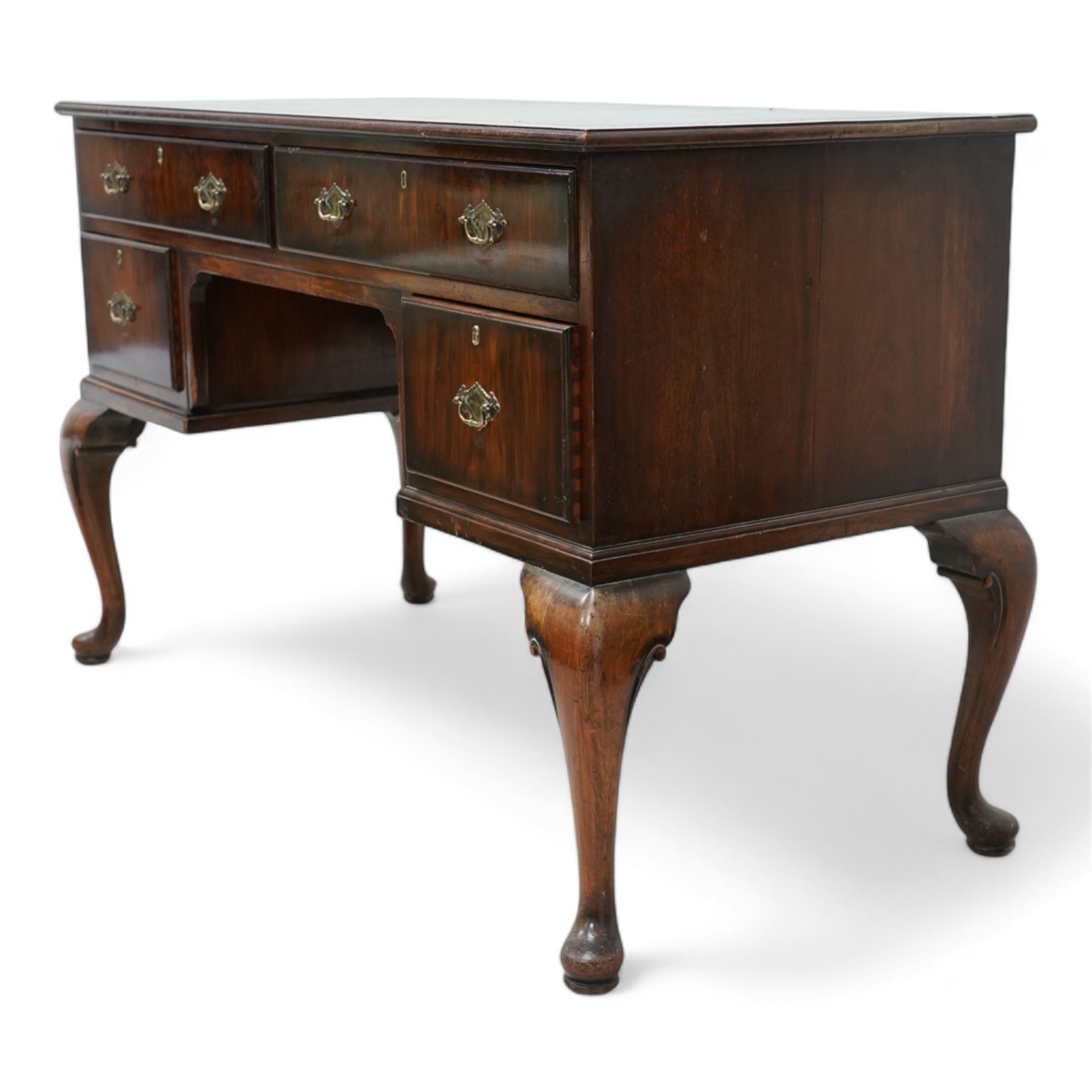 Early 20th century kneehole desk, moulded rectangular top with green leather inset, fitted with four drawers, on cabriole supports