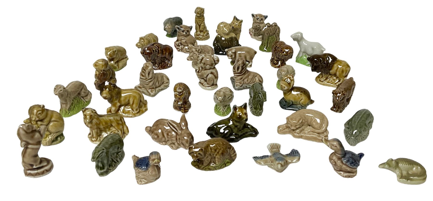 Collection of Wade Whimsies, including lions, birds, rabbits etc 