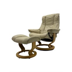 Ekornes Stressless - swivel armchair upholstered in cream leather (W81cm, H103cm); together with matching stool (W49cm)