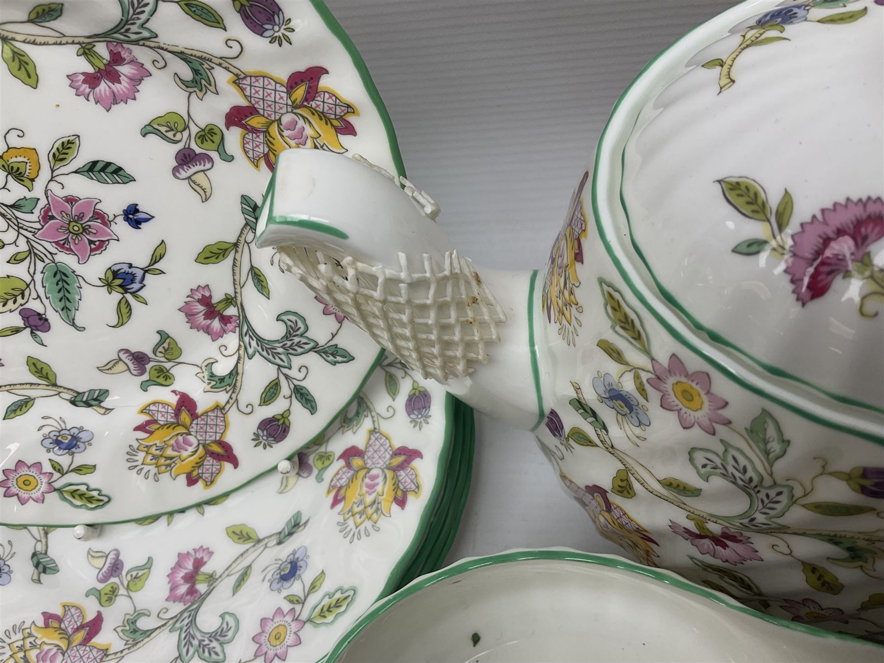 Minton Haddon Hall pattern tea service for twelve place settings, to include teapot, sugar bowl, milk jug, twelve cups and saucers and twelve dessert plates (39)