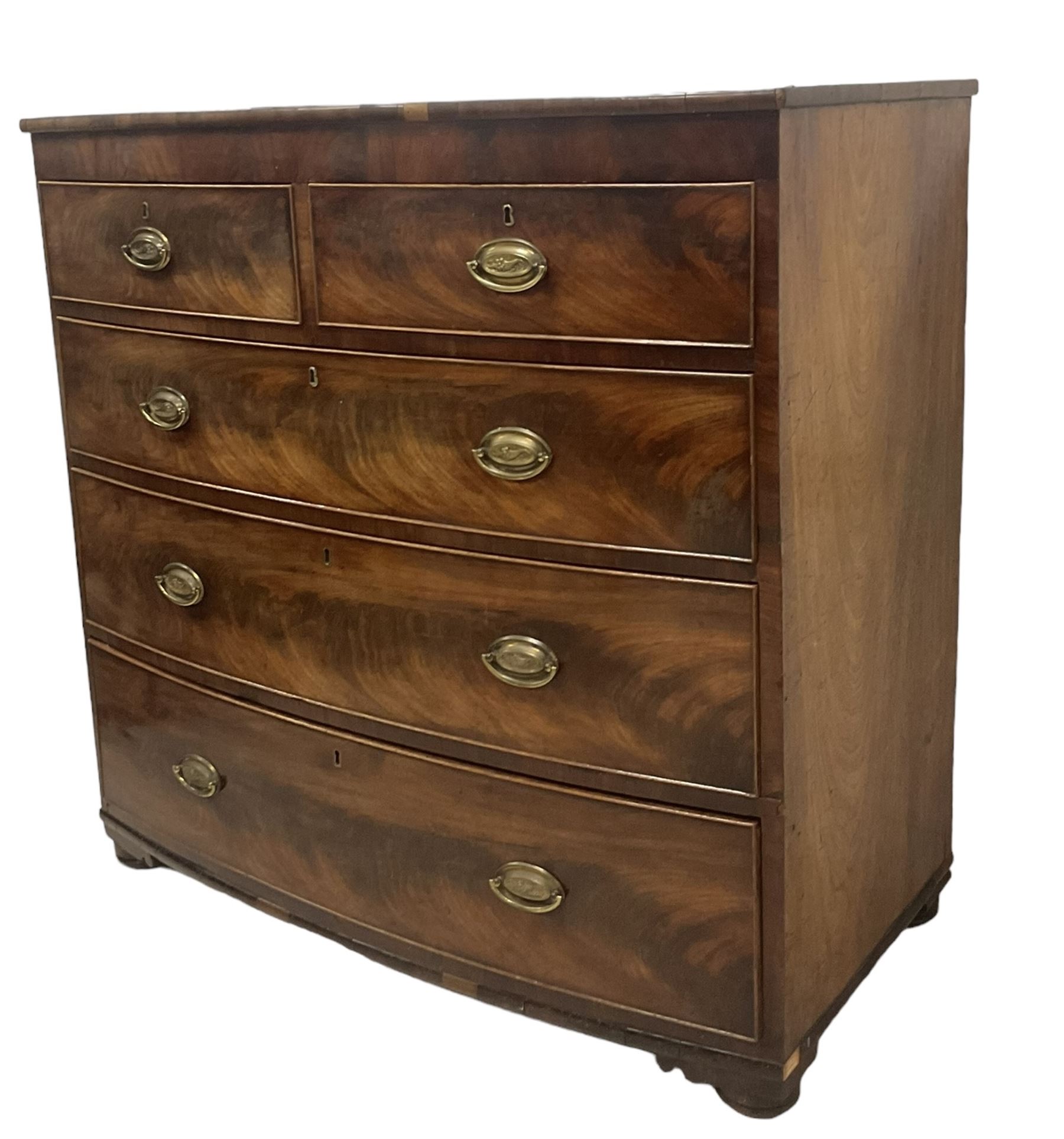 George III mahogany bow-front chest, fitted with two short over three long graduating cock-beaded drawers, on compressed bun feet