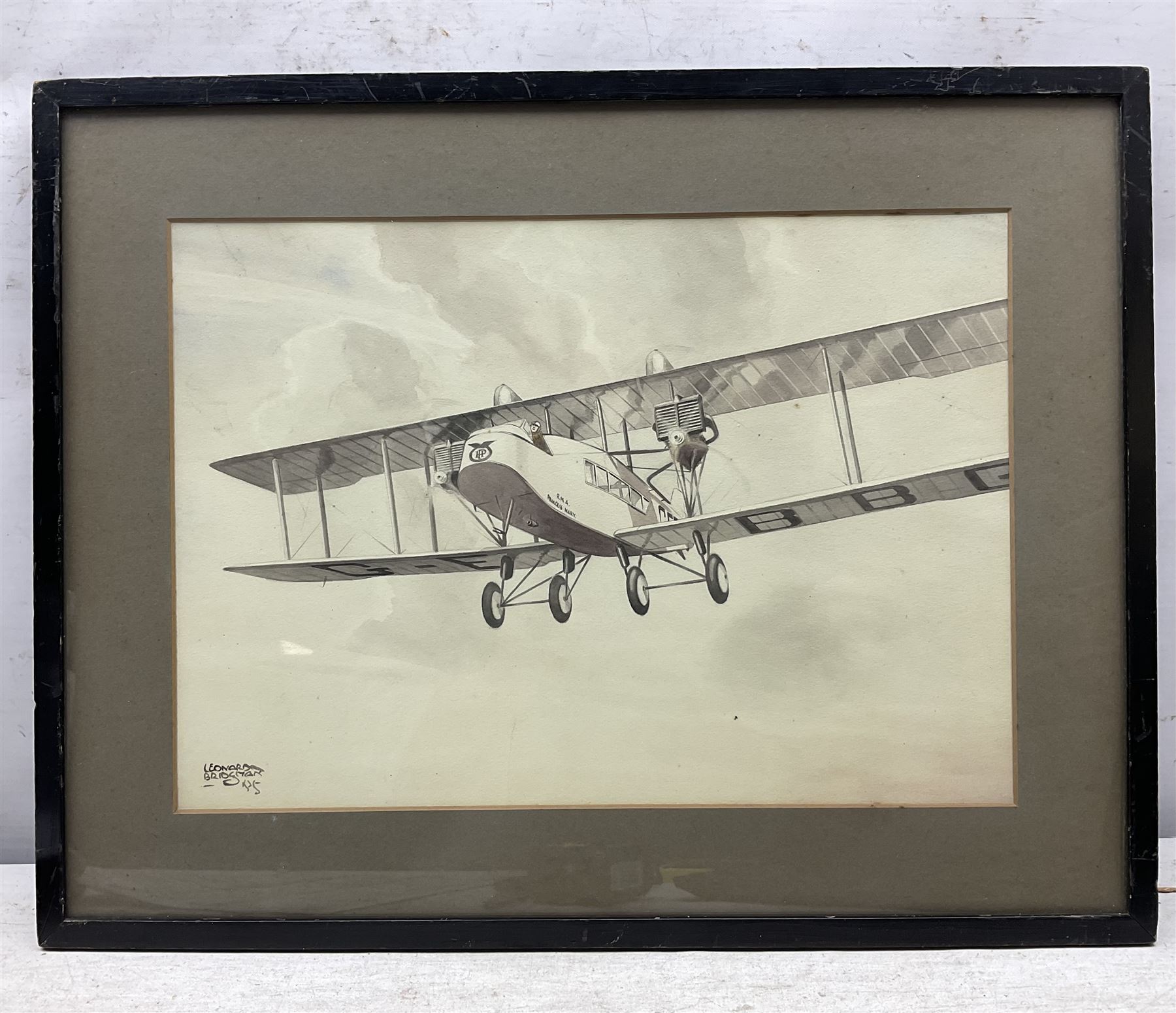 Leonard Bridgman (British 1895-1980): R.M.A Princess Mary - Biplane in Flight, monochrome watercolour signed 26cm x 36cm 