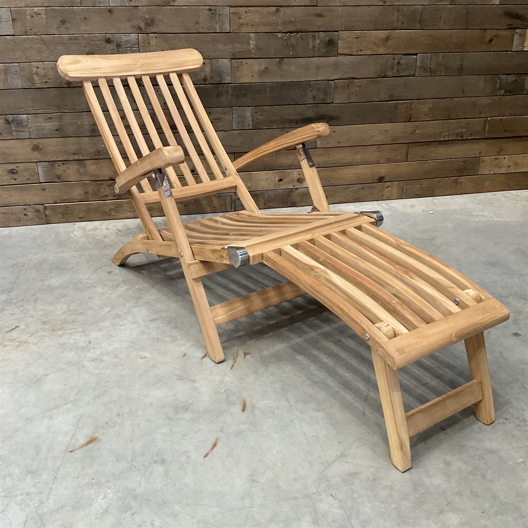 Pair of solid teak adjustable garden steamer armchairs, stainless brackets, with cushions