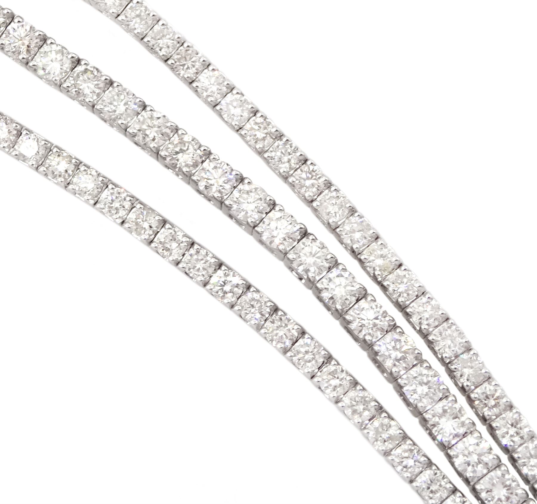 18ct white gold three row round brilliant cut diamond bracelet, stamped, total diamond weight approx 7.70 carat