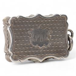 Small Victorian silver vinaigrette of serpentine outline, the cartouche engraved with init...