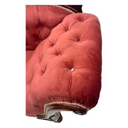 Victorian mahogany framed chaise longue, upholstered in pink velvet, the scrolled back with button-tufting, on turned feet