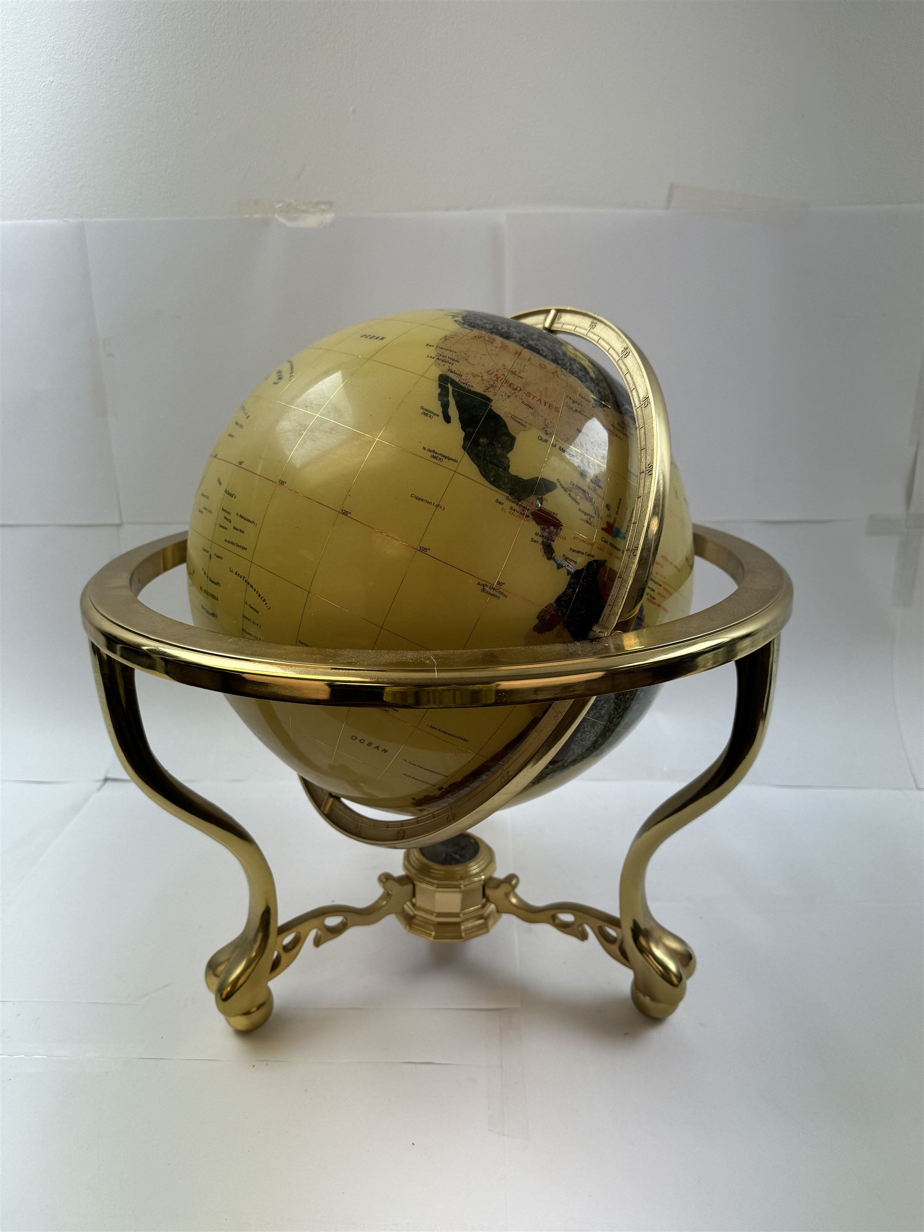 Polished gemstone terrestrial globe on gilt metal stand, H47cm