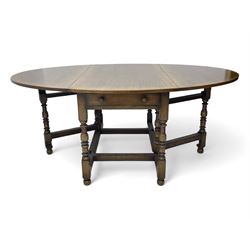 Titchmarsh & Goodwin - 17th century design oak drop leaf dining table, oval top with hinged drop leaves, single drawer to one side with applied makers label, baluster-turned supports united by stretchers