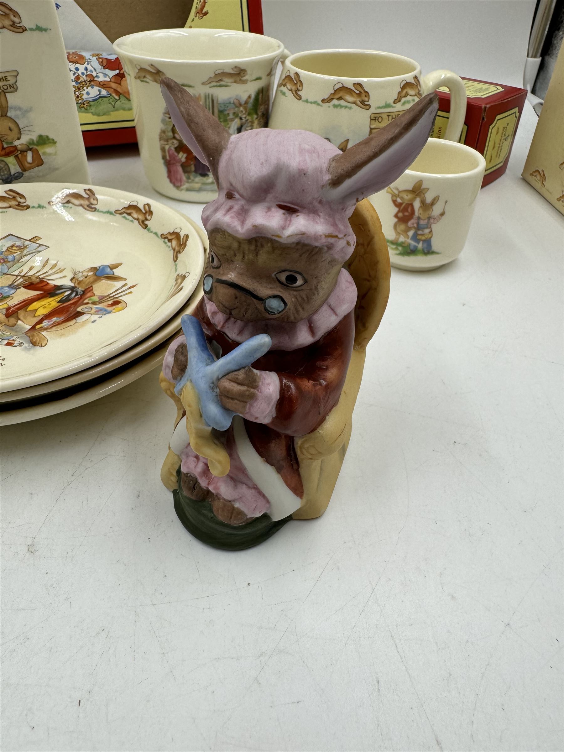 Royal Doulton Bunnykins teawares, including teacups and saucers, egg cup, money boxes etc (12)