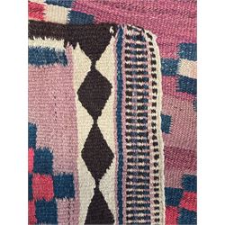 Turkish Anatolian lilac ground kilim rug, the field decorated with three columns of geometric lozenges, enclosed by plain guard stripes 