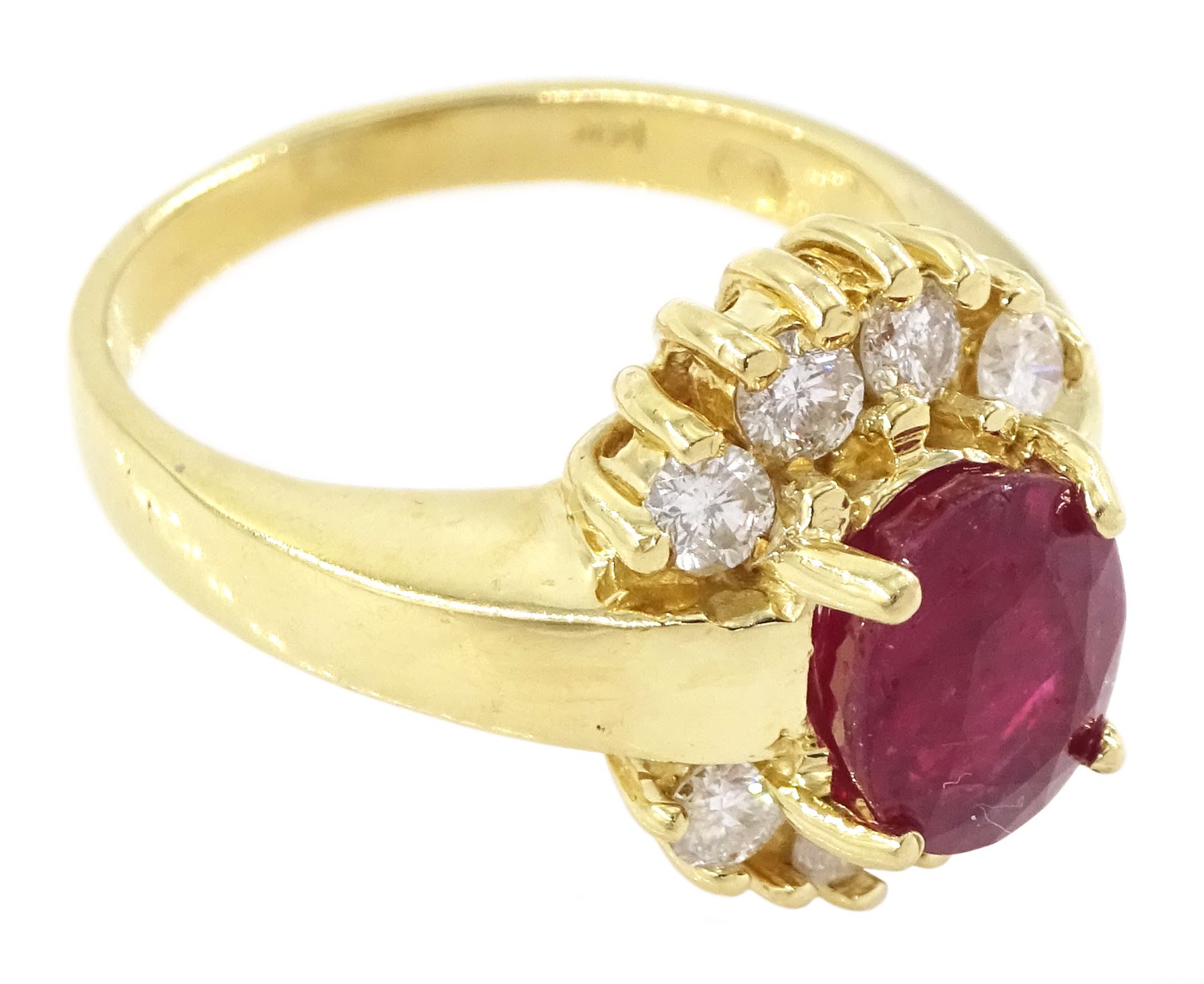 14ct gold oval cut ruby and round brilliant cut diamond cluster ring, stamped, ruby approx 2.00 carat, total diamond weight approx 0.40 carat