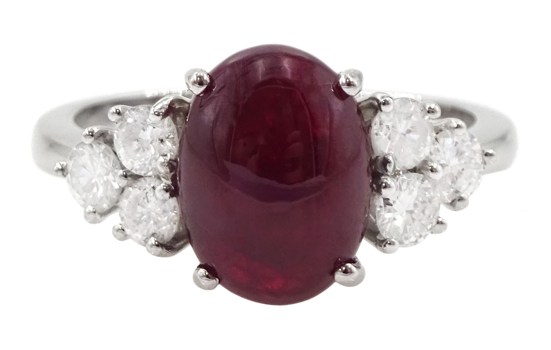 18ct white gold cabochon cut ruby and six stone round brilliant cut diamond ring, hallmarked, ruby approx 3.70 carat, total diamond weight approx 0.55 carat