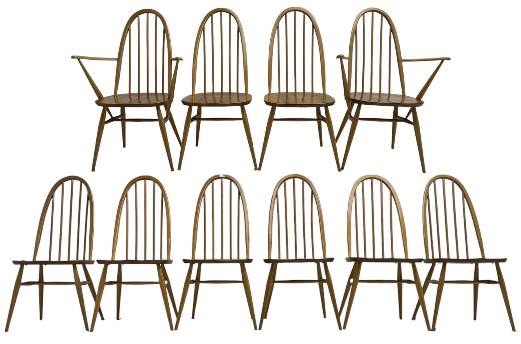 Ercol - light elm and beech set of ten (8+2) 'Quaker Windsor' dining chairs, high hoop and stick back over splayed supports united by H-stretcher, with foliate patterned crimson loose seat cushions