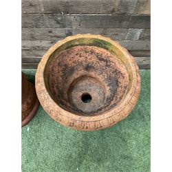 Circular terracotta garden planter, decorated with cherubs and terracotta urn on plinth - THIS LOT IS TO BE COLLECTED BY APPOINTMENT FROM DUGGLEBY STORAGE, GREAT HILL, EASTFIELD, SCARBOROUGH, YO11 3TX