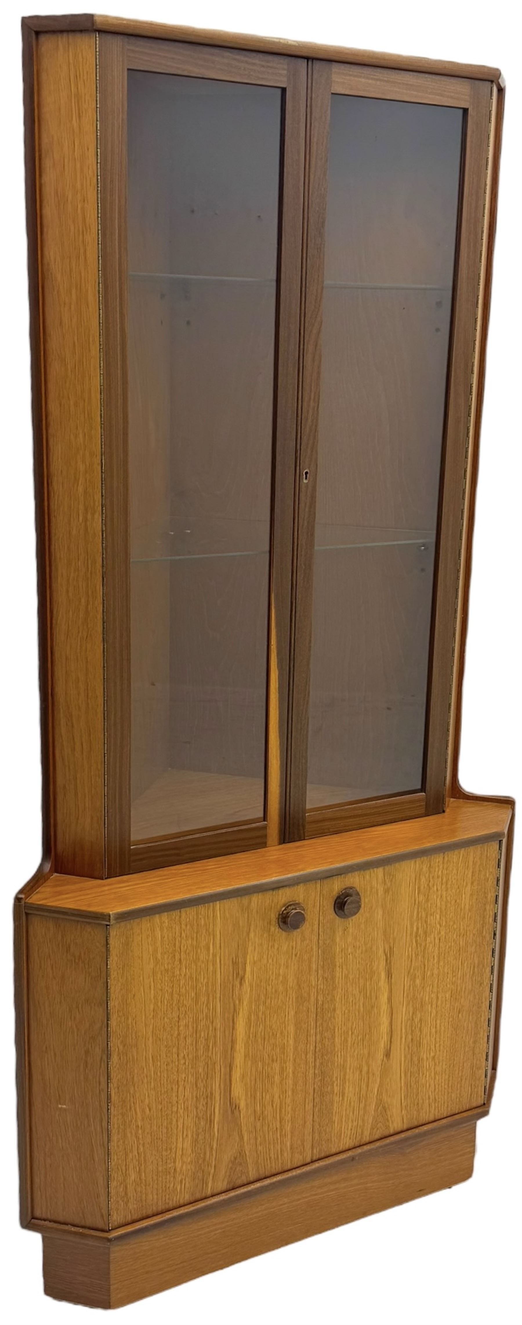 Nathan - teak corner display cabinet, double glazed doors enclosing two adjustable shelves over single cupboard.