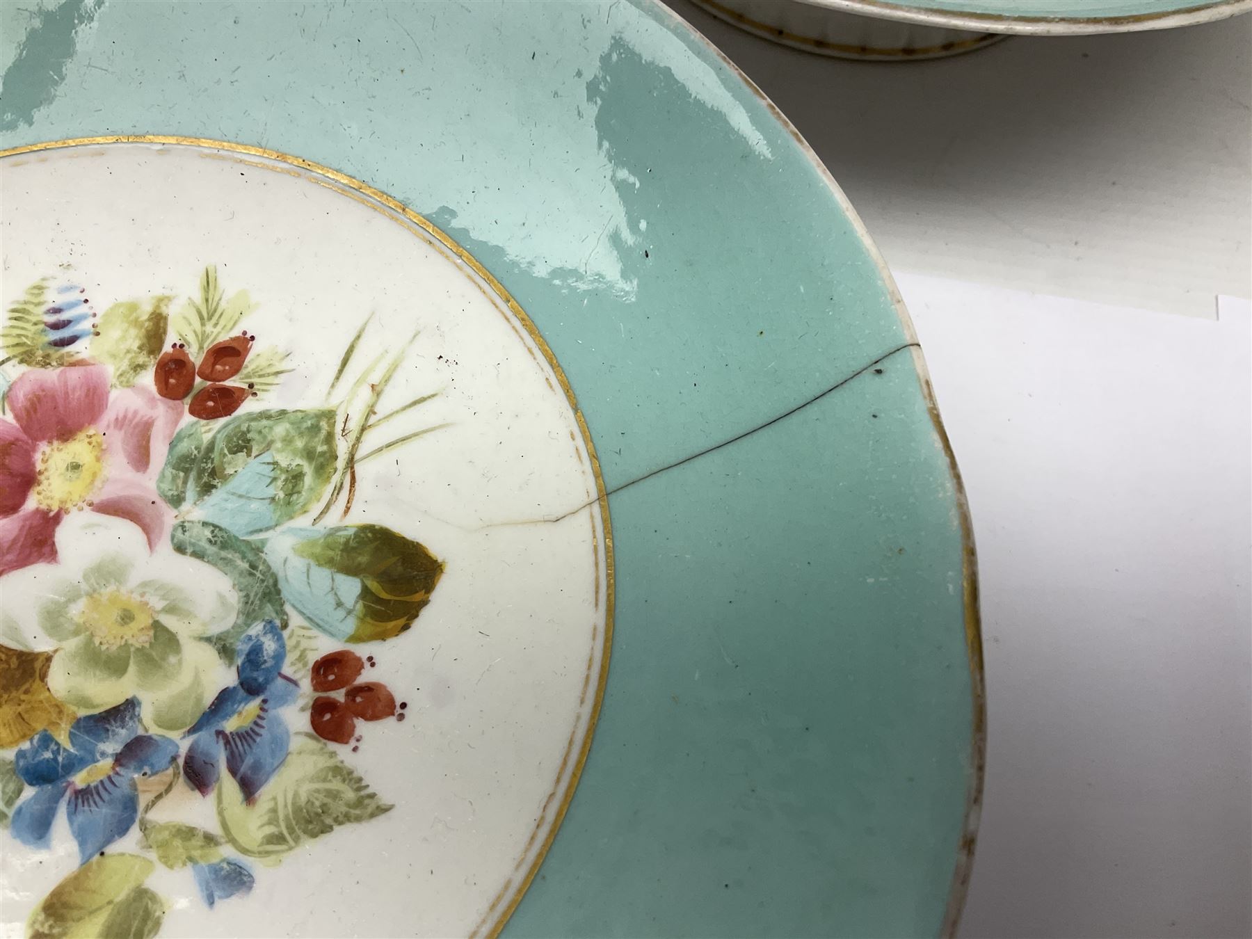 Victorian dessert service, comprising three comports and twelve plates, each decorated with floral sprigs to the centre with a blue and gilt border