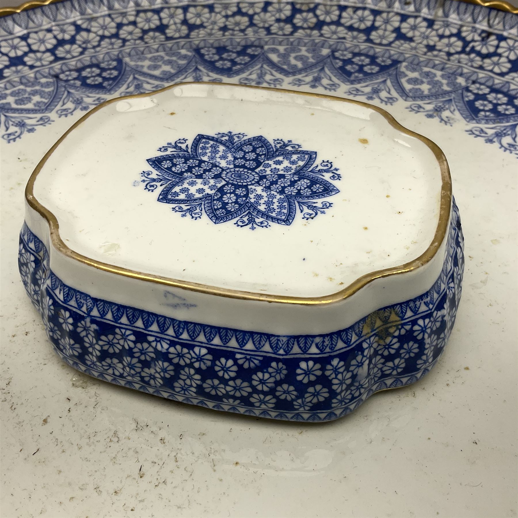 Late Victorian W T Copeland & Sons Primrose pattern coffee set for six, pattern no 2724, comprising coffee pot, milk jug, sugar bowl and six coffee cans and saucers, all upon a Lazy Susan, of circular form, with gilded rim and upon domed pedestal foot, with printed mark beneath, D44.5cm