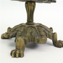 Victorian brass two tier cotton reel stand, with vacant finial of fluted form, on a acanthus cast base with four lion paw supports, H24cm 