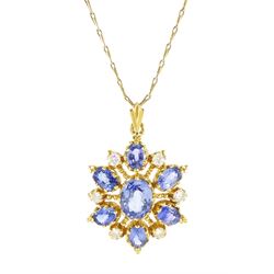 18ct gold seven stone oval cut sapphire and six stone round brilliant cut diamond cluster ...