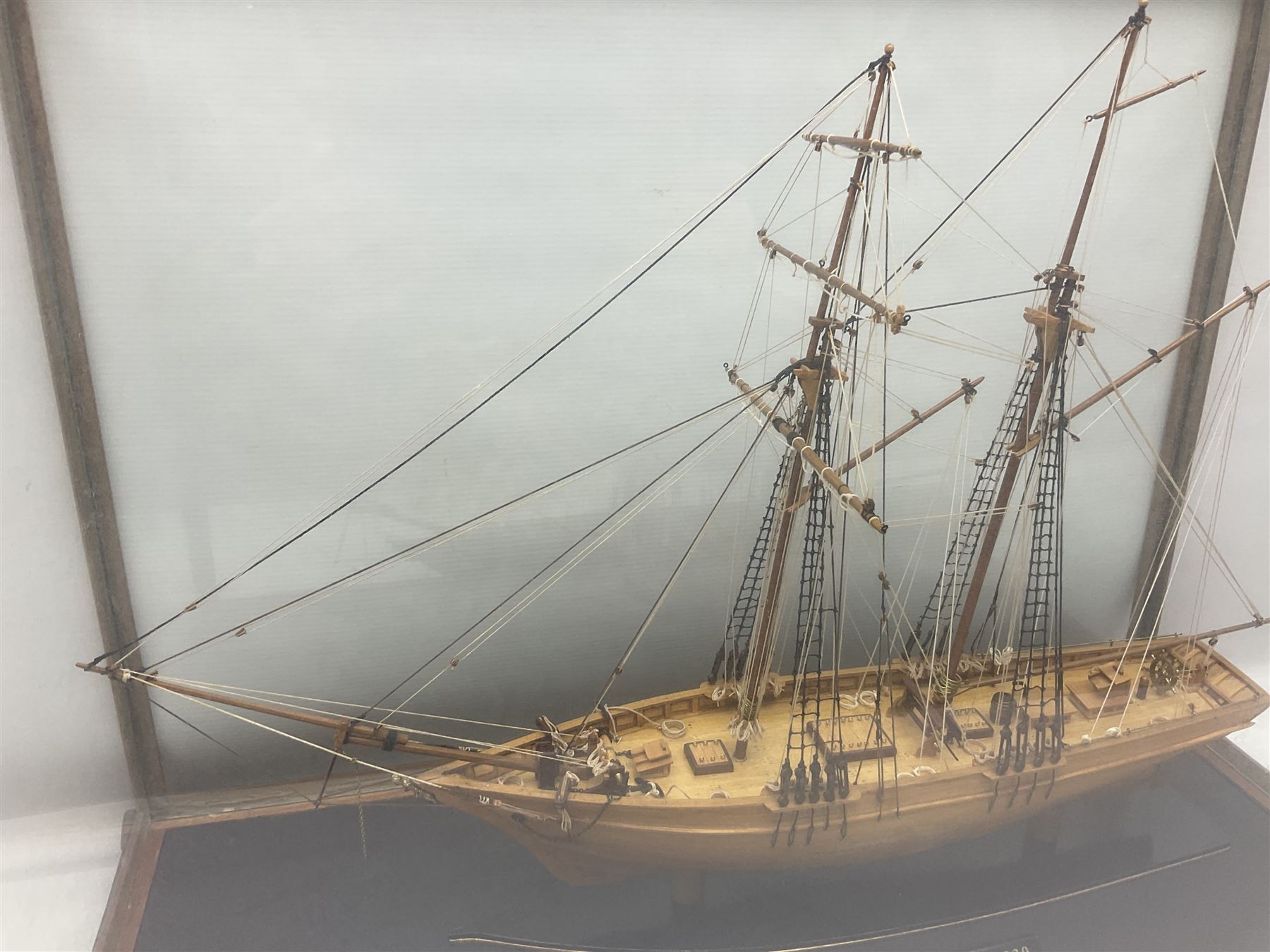 Cased scale built wooden model schooner 