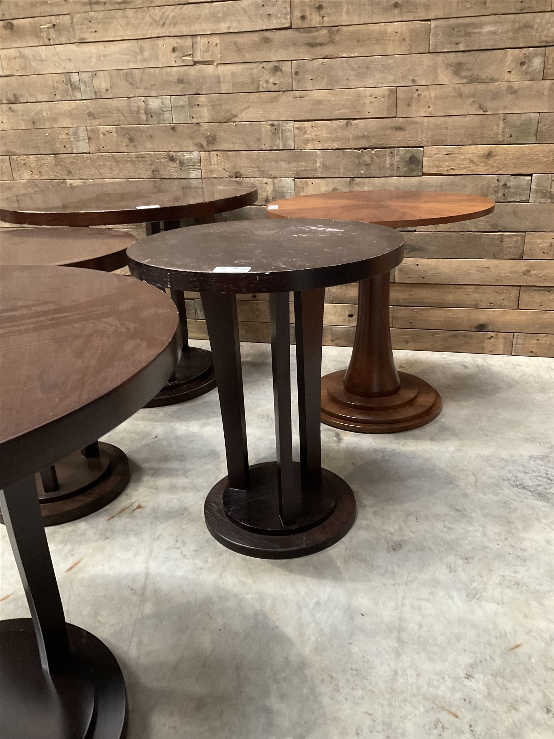 Circular walnut occasional table and four other circular tables