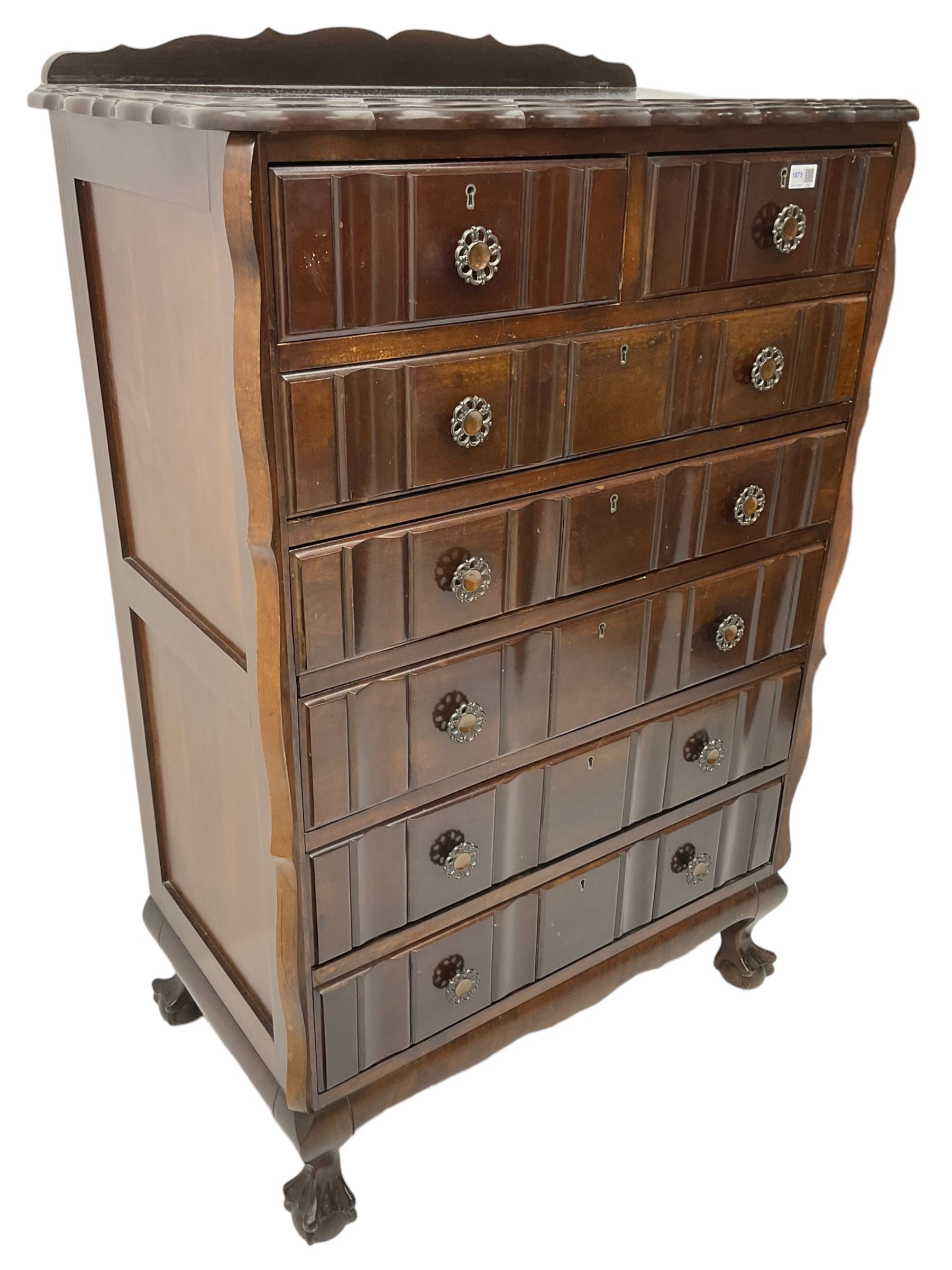 Early 20th century Dutch design mahogany chest, raised back over shaped top, fitted with two short and five long drawers, raised on ball and claw feet