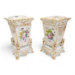 Pair of 19th century French porcelain jardinieres, in the style of Jacob Petit, each of square form, the body painted with panels of exotic birds and sprays of flowers, below a scroll and gilt moulded border, raised upon four swan feet and scroll base, unmarked, H34cm x W20cm