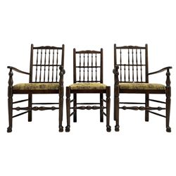 Set of six (4+2) 20th century oak spindle back dining chairs, with upholstered drop-on seat cushions, turned supports joined by turned stretchers