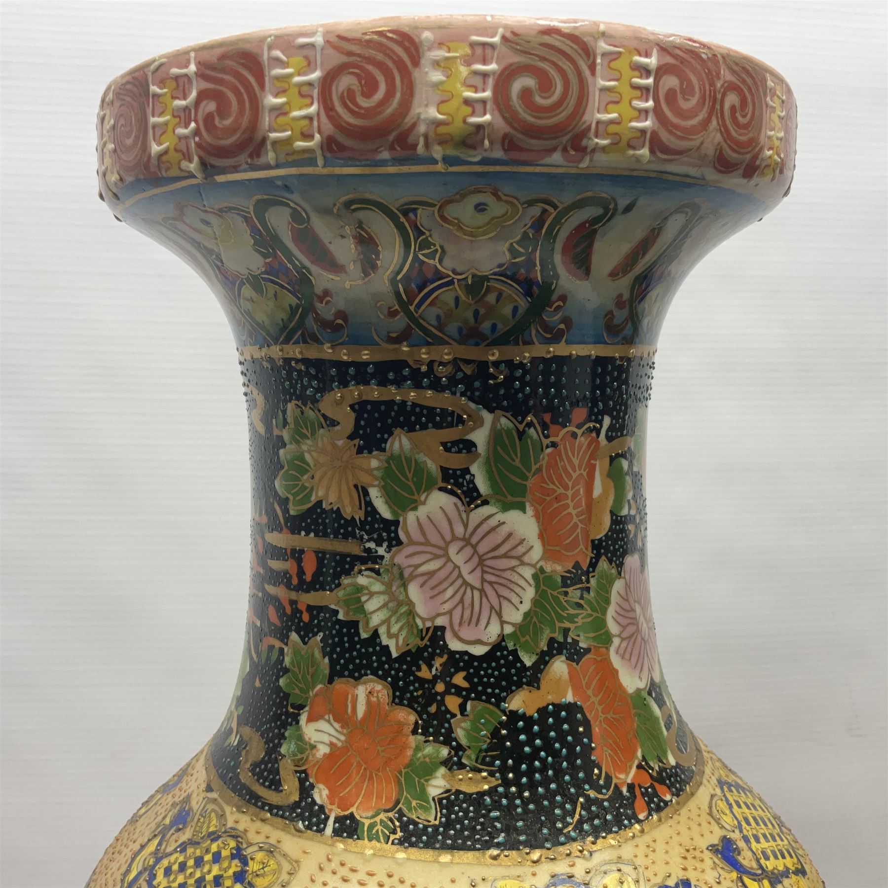 Pair of modern Satsuma vases of baluster form, decorated with figures in within river landscapes and floral borders, highlighted in gilt, H60cm