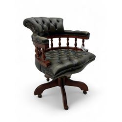 Captain's swivel desk chair, upholstered in studded green leather