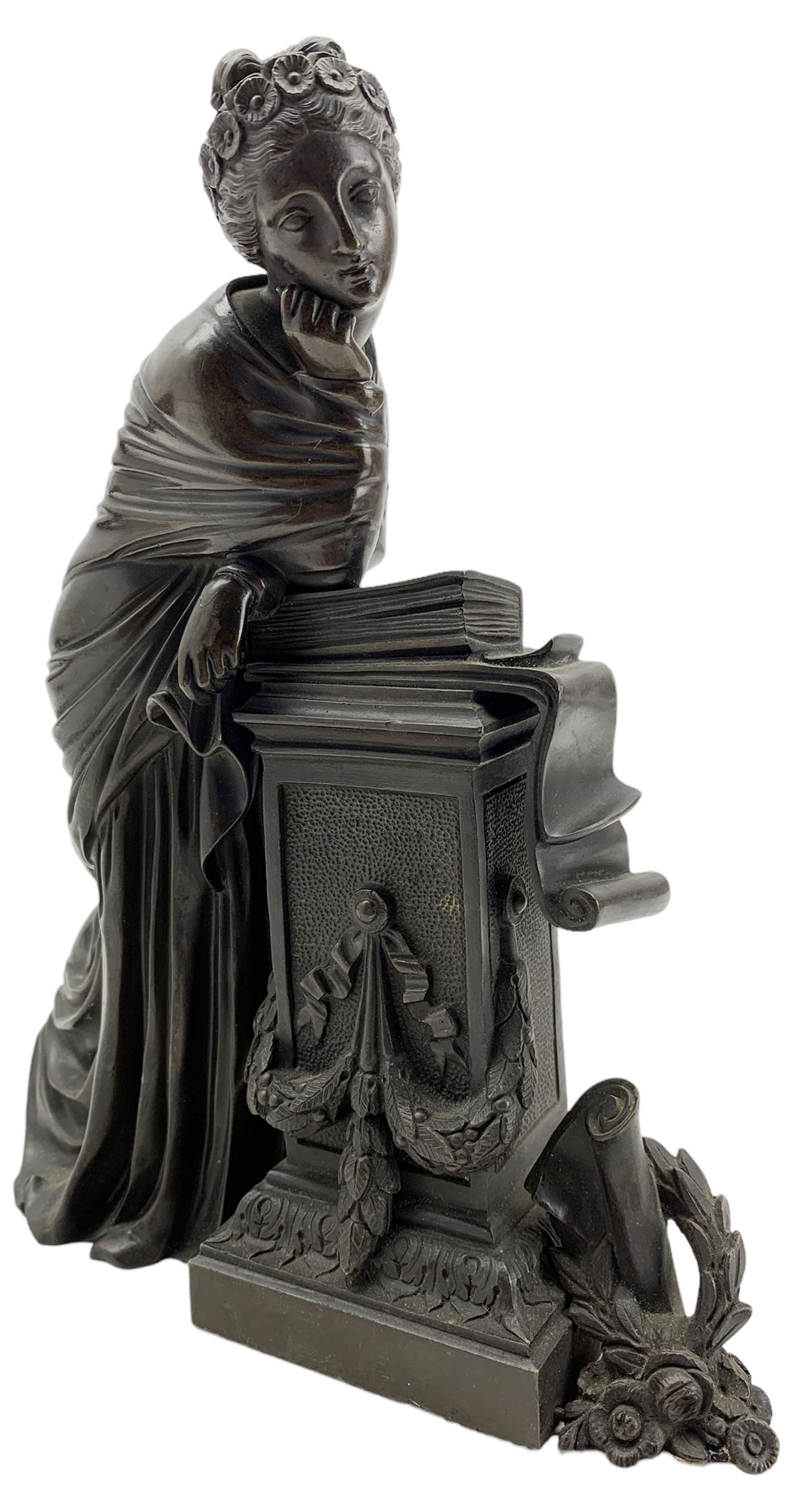 19th century French bronze sculpture of a Classical female muse leaning against a pedestal applied with a book, unsigned, numbered verso 2783, H26cm