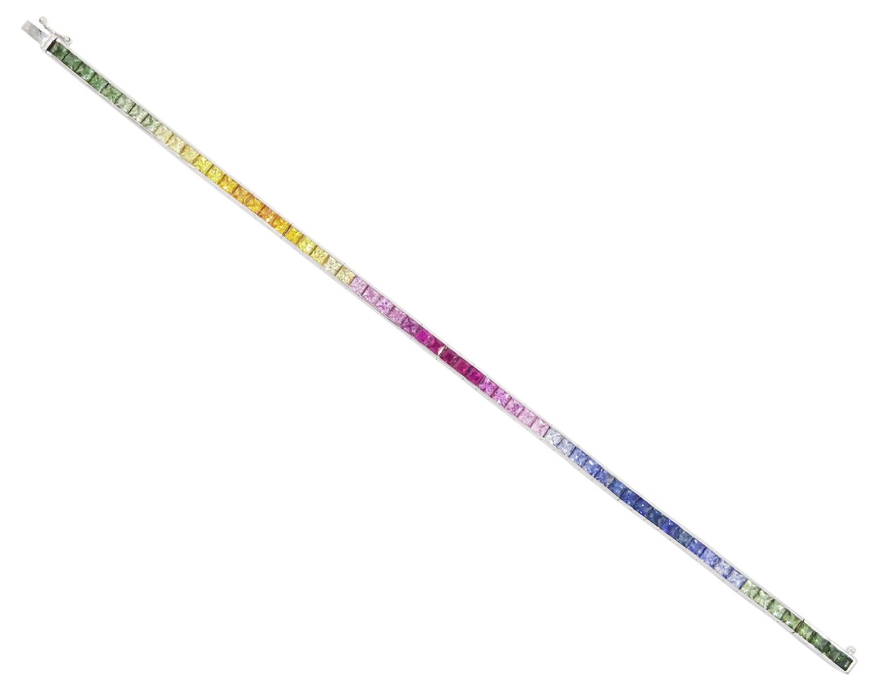 18ct white gold channel set multicoloured sapphire bracelet, sixty-one princess cut sapphires, various hues including blue, pink, green, yellow and teal, London 2004