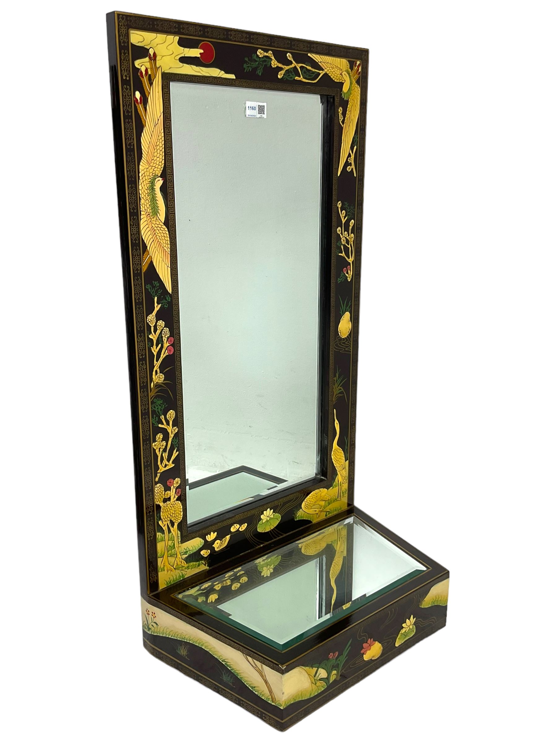 Chinoiserie design wall hanging mirror with shelf, the rectangular frame with raised decoration depicting birds and landscapes, fitted with bevelled glass 