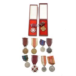 Five Poland Cross of Merit medals, two 2nd class, three 3rd class, together with five othe...