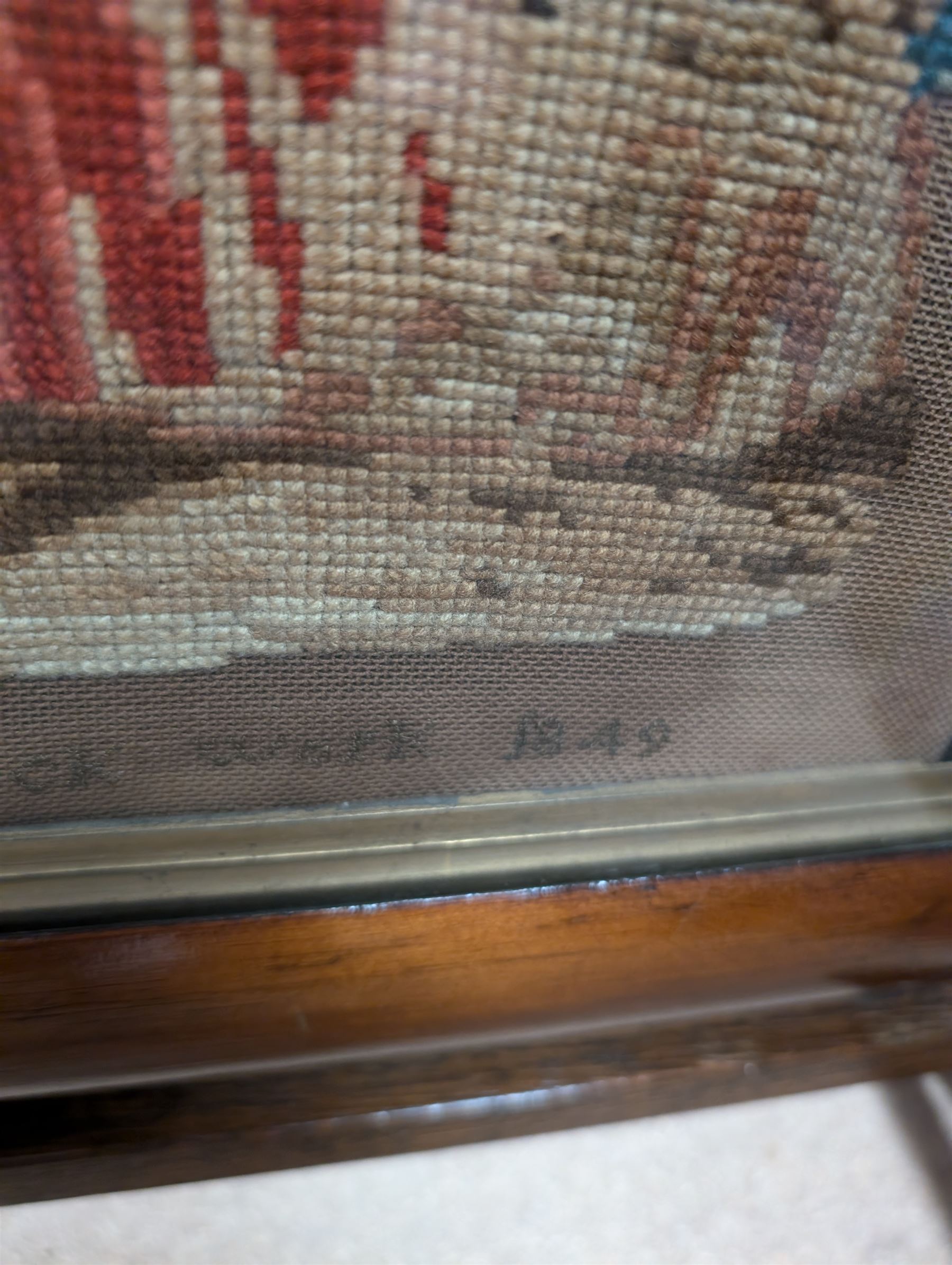 Victorian sampler, depicting woman and young child feeding rabbits, worked by Mary Ann Siswick 1849, set within an oak fire screen, fire screen H75.5cm