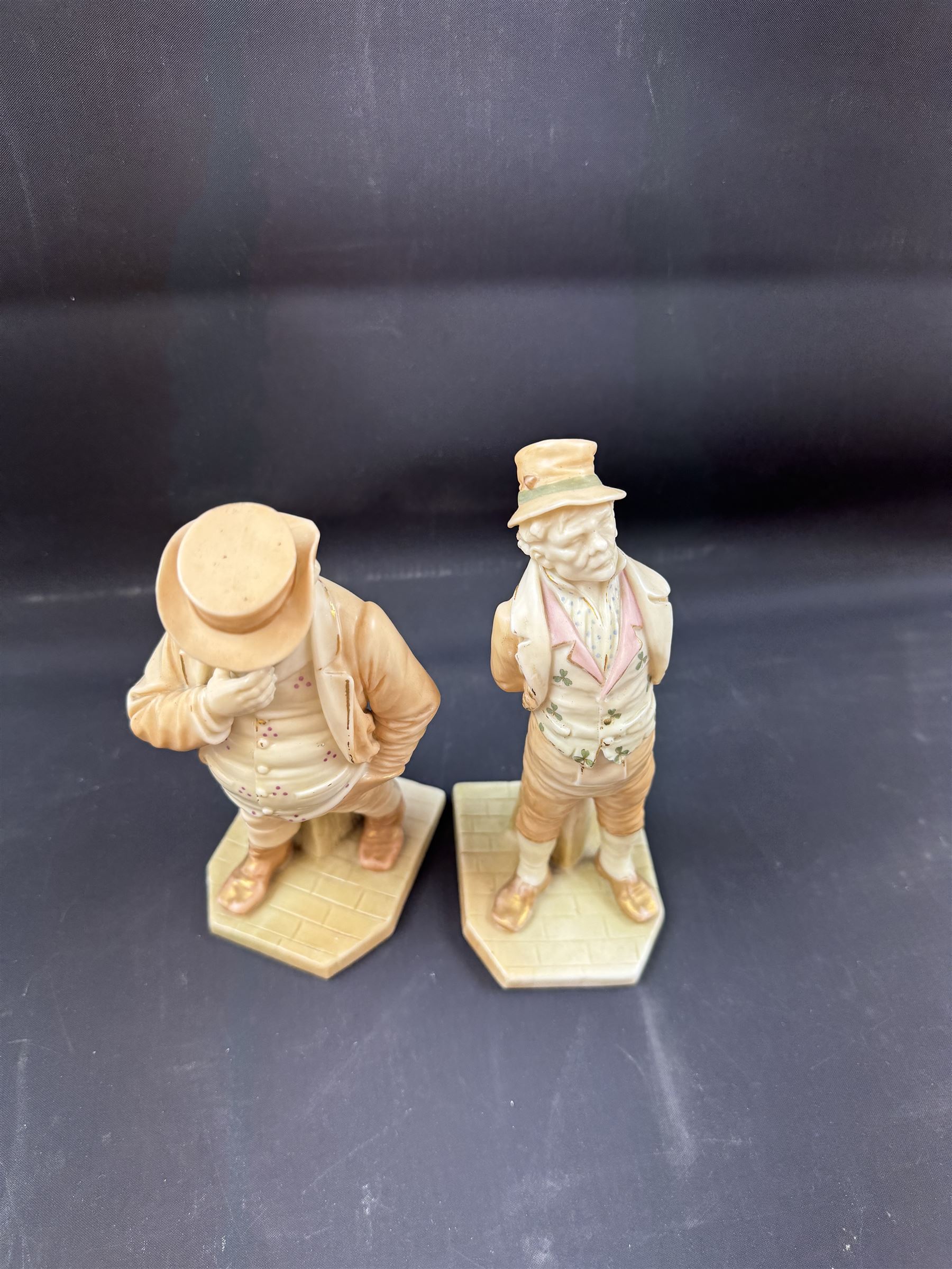 Two Royal Worcester blush ivory figurines, comprising Irish Man and John Bull, both with printed mark beneath, H18cm