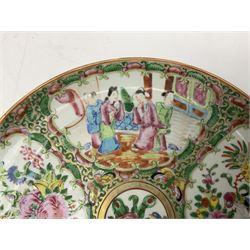 Chinese Famille Rose plate, decorated in polychrome enamels with four figural panels, D24cm.