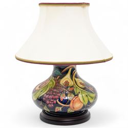 Moorcroft Queens choice pattern table lamp, of squat baluster form with original lampshade, H46cm