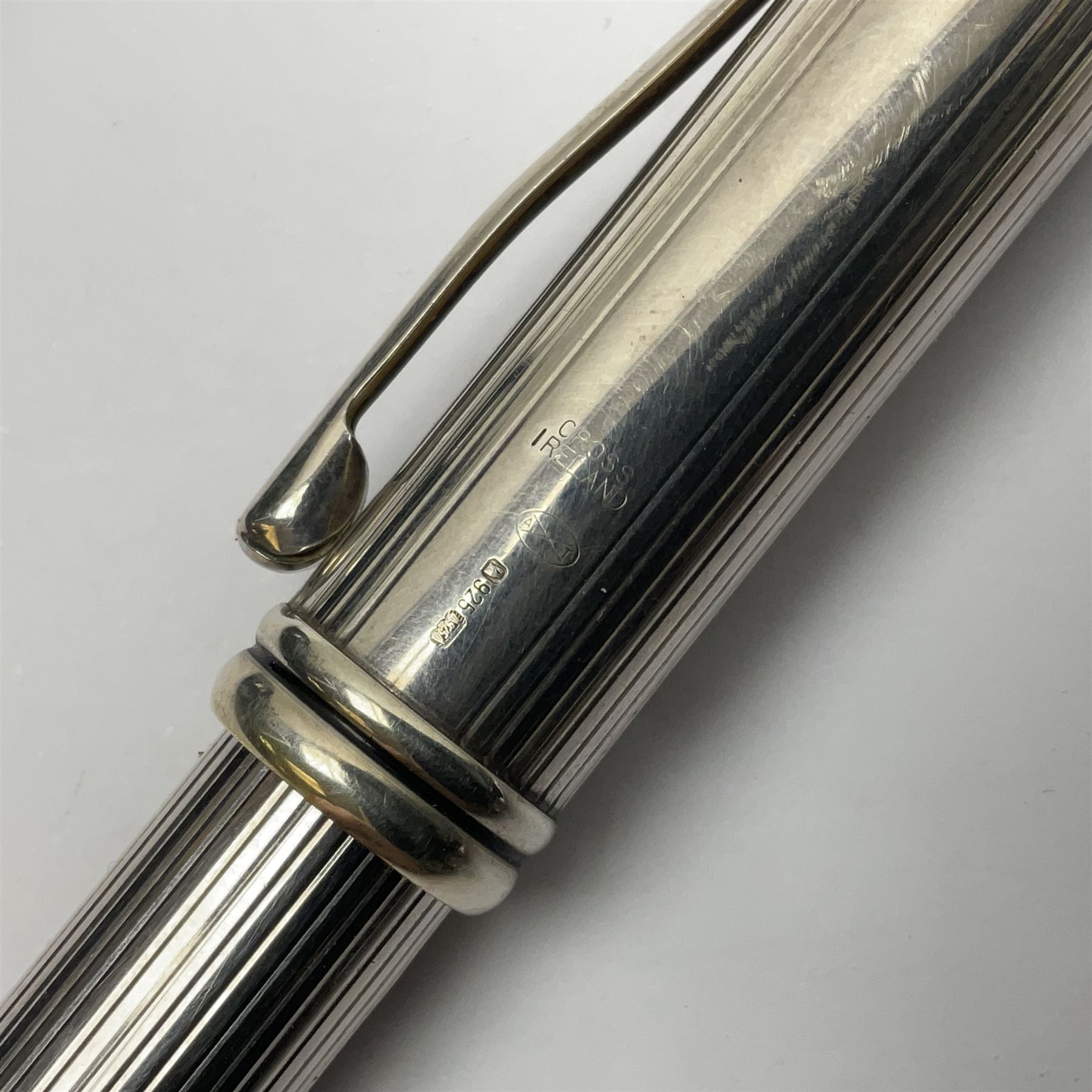 Cross sterling silver fountain pen, having fluted barrel and cap, stamped 