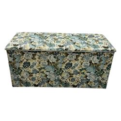 Mid 20th century oak blanket box, upholstered in floral pattern fabric, padded hinged lid enclosing oak interior with two removable trays, brass side handles, on round metal supports