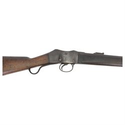 Martini-Henry MKII/2 Carbine, the 52cm round barrel with various inspectors marks,   fitted with ladder sight, with various inspector's marks, the action marked Enfield, the walnut full stock with two steel barrel bands, the butt inset with brass roundel stamped' 12 1893 V 1 GR. A 6', and with Sold Out of Service arrows to the butt, action and barrel, steel cleaning rod beneath, overall 96cm
Sold as an exempt item under Section 58 (2) of the 1968 Firearms Act, to be held as a curiosity or ornament


