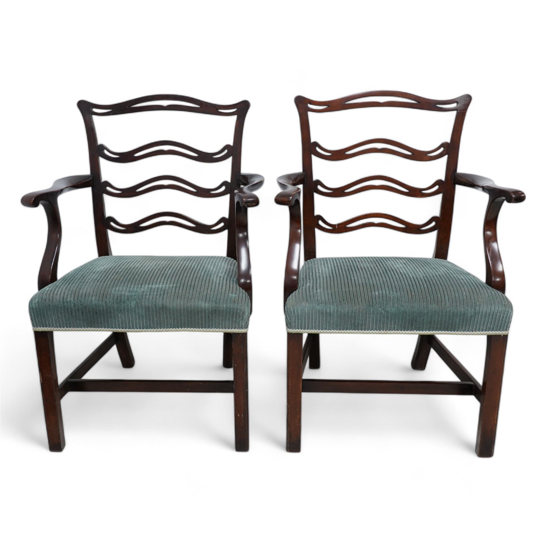 Set of six (4+2) Chippendale Revival stained beech dining chairs, pierced waived ladder backs with over-stuffed seats, on square moulded supports joined by stretchers