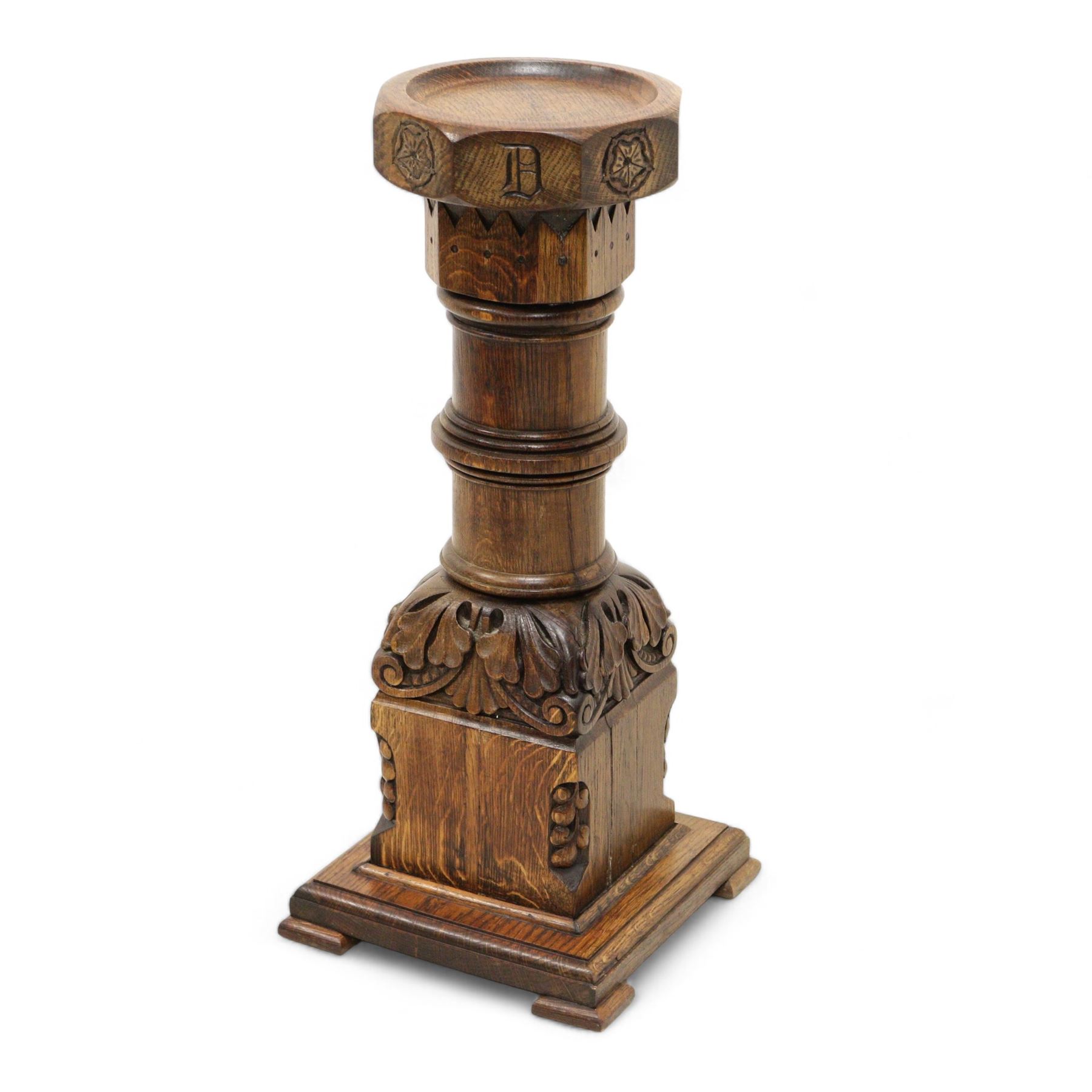 Early 20th century carved oak ecclesiastical baptismal font, circular dished top with hexagonal edge carved with Yorkshire rose and lettering, turned pedestal with acanthus carved decoration, on square base with ogee feet