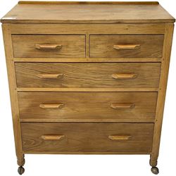 Yorkshire Oak - oak chest, fitted with two short over three long drawers, on octagonal feet with castors 