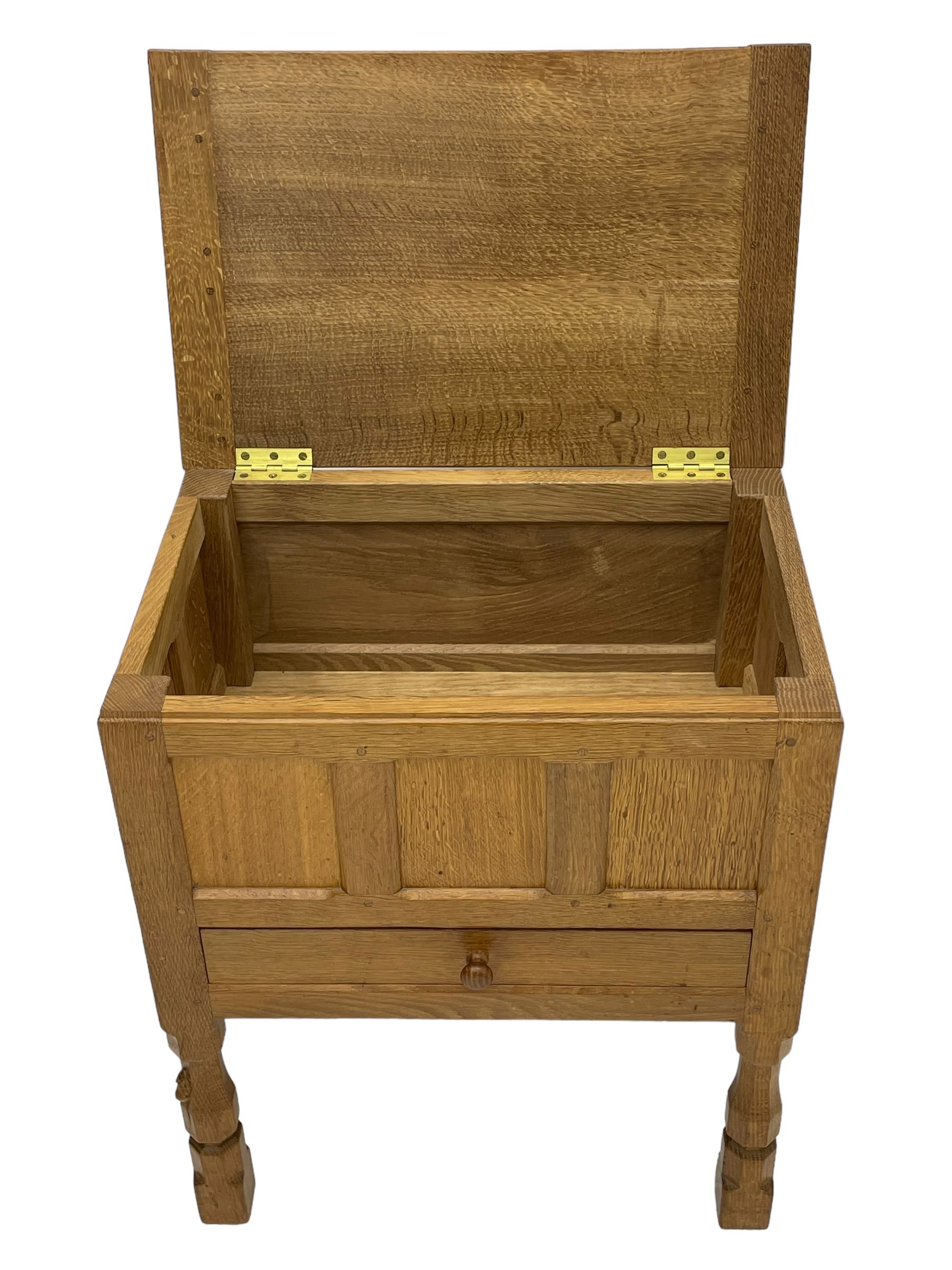 Mouseman - oak work or sewing box, rectangular adzed top inscribed 'L. M. C. 1976' enclosing vacant interior, triple panelled front and double panelled sides, fitted with single drawer, on octagonal supports, carved with mouse signature, by the workshop of Robert Thompson, Kilburn 