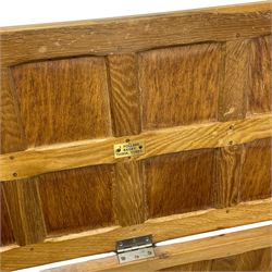 Sid Pollard (ex. Mouseman) - Yorkshire oak blanket chest, all over panelling, enclosed by hinged lid, on octagonal feet, interior plaque inscribed 'S. Pollard, Bagby, Thirsk, Yorks' 