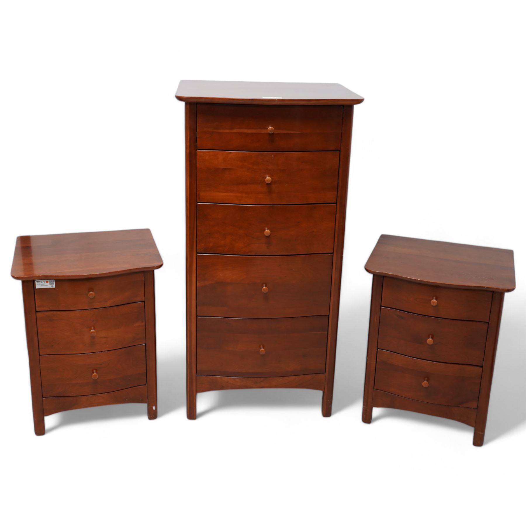 Willis & Gambier tall cherry wood serpentine front pedestal chest, fitted with five drawers, raised on square supports (W64cm D54cm H127cm); matching pair of bedside pedestal chests, fitted with three drawers (W52cm H66cm); and double headboard (W159cm) (4)