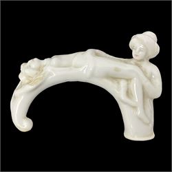 Late 19th/early 20th century Japanese erotica white glazed porcelain walking stick handle, modelled as two geishas, W10cm