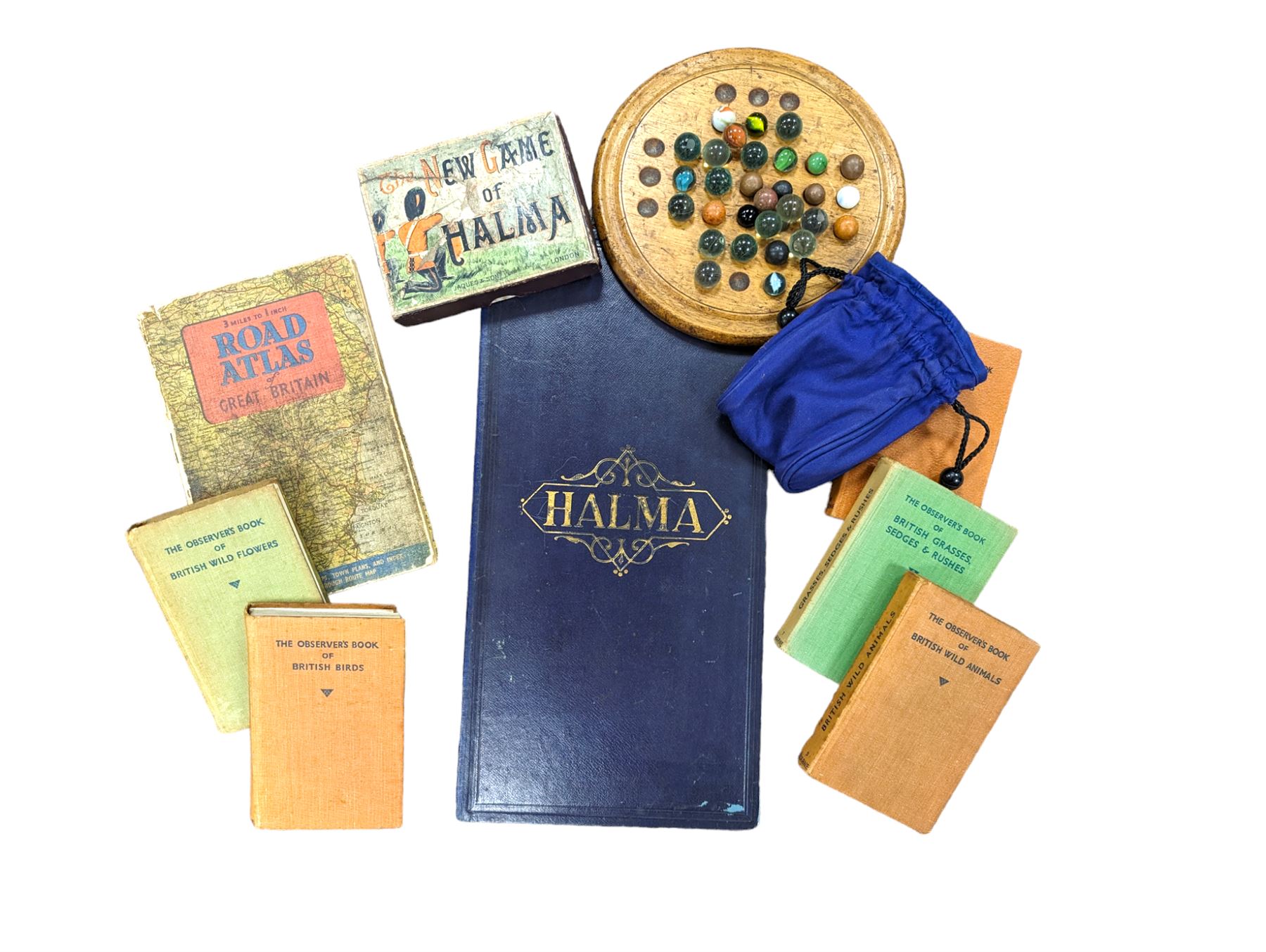 Five Observers books, a 3 mile to 1 inch Road Atlas, Halma board and a marble solitaire game