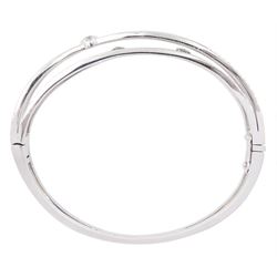 Boodles 'Labyrinth' platinum round brilliant cut diamond bangle, London 2009, total diamond weight approx 0.50 carat